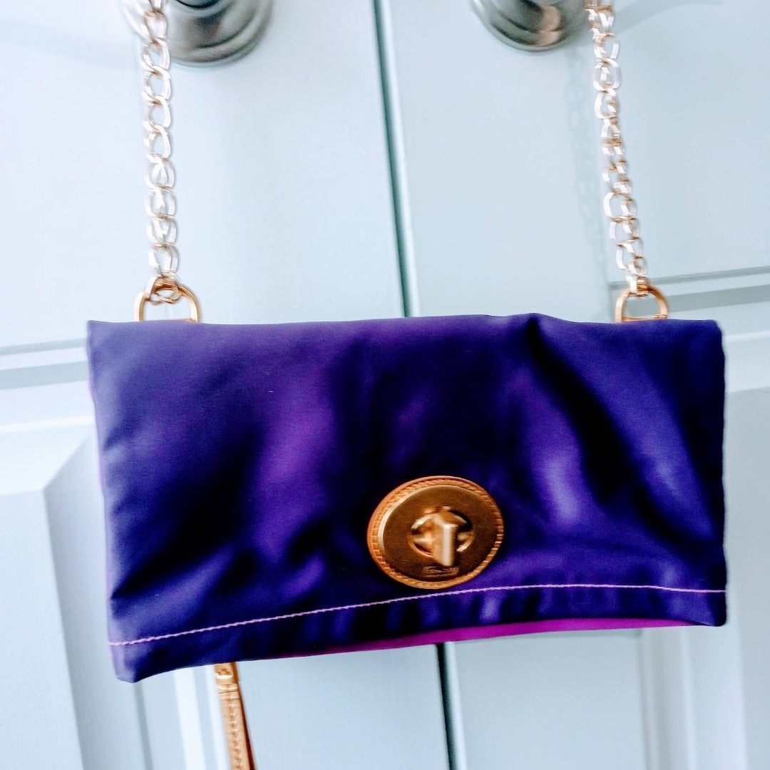 Coach Purple Clutch With Gold Chain